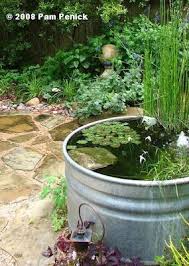 Como Hacer Un Estanque Acuatico Con Plantas Y Peces Container Water Gardens Water Garden Water Features In The Garden