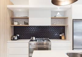 *matte black finish is the perfect complement to modern spaces *power clean(tm) spray technology provides 50 percent more spray power versus most of our pulldown and pullout faucets without the power clean(tm) technology. Tired Of White Subway Tile You Ll Love This Moody Backsplash Trend Black Tiles Kitchen Kitchen Splashback Tiles Black Backsplash