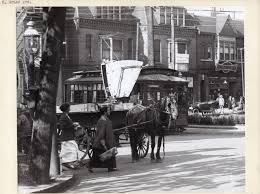 women walking across East Grand Avenue ...