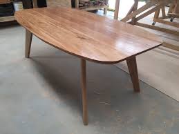 Rounded Rectangular Shaped Dining Table With Angled And Tapered Legs Made From Beautiful Blackbutt Rectangular Dining Table Dining Table Bespoke Dining Table