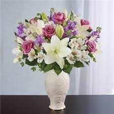 The purple rose can come in a variety of shades and the lighter shades are associated with love at first sight as well as true love. 1 800 Flowers Loving Blooms Lenox Lavender White Seattle Wa