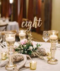 There are an enormous amount of wedding table numbers to choose from so do google them, see what you love, discard what you don't and create yourself a mood board with them to see if they match your style. 30 Great Ideas For Table Numbers Apkbridal