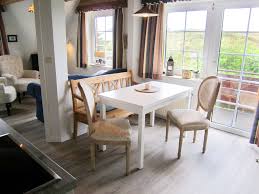 Offering 4 double bedrooms, open plan living room, kitchen just off of it and maids room on the top floor. Haus Fortuna Langeoog Wohnung 3