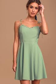 Celebration Sage Green Ruffled Skater Dress In 2020 Backless Mini Dress Skater Dress Light Green Dress