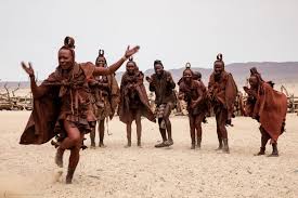As water is scarce they use a mixture of pastes on both their bodies and hair. How Do Namibian Himbas See Colour Himba Colour People Namibia African Dance Namibian Ritual Dance