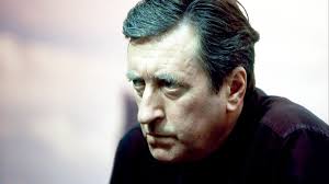 Night Watch by Terry Pratchett ('02). Commander Sam Vimes of the City Watch  falls across four dimensions and ends up in his own past where it's even  harder to stay alive. Fully