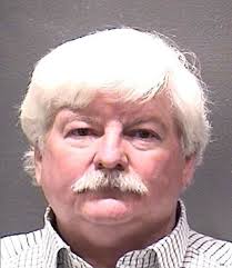 Two Charged in 1998 Homicide