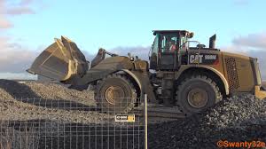 The reliability, durability, and versatility result in a machine that is better built to meet your needs. 4k Cat 980m Wheel Loader Piling Crushed Rocks Youtube