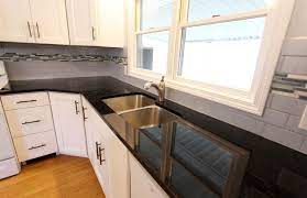 It is quarried in india and is commonly also known as the stunning contrast with white kitchen cabinets is a strong and bold effect. White Thermofoil Cabinets With Black Pearl Granite Countertops Brunswick Oh Transitional Kitchen Cleveland By Cabinet S Top Houzz