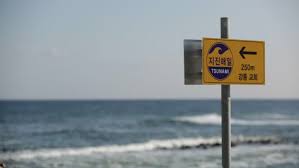 Tsunami warning sign is seen on the south coast south coast of upolu island on september 12, 2015 in apia, samoa. Sign Escape Route In Case Stock Footage Video 100 Royalty Free 23406277 Shutterstock