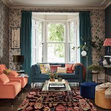 On the wall behind the sofa, the chinoserie wallpaper and golden mirrors work together to give the room a touch of flash without overstating their presence and drowning the sofa out. Living Room Trends 2021 Top Styling Tips For The New Year
