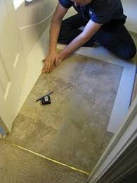 Installing Peel And Stick Tile Stick On Tiles Peel And Stick Tile Diy Flooring