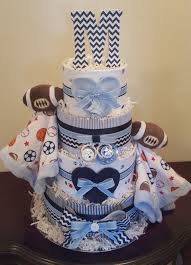 This cheery yellow and gray shower celebrates the future scholar with an alphabet theme. Sports Themed Diaper Cake Twin Boys Baby Shower Centerpiece Gift Visit My Facebook Page Simply Sho Zur Geburt Junge Windeltorte Junge Baby Geschenke Basteln