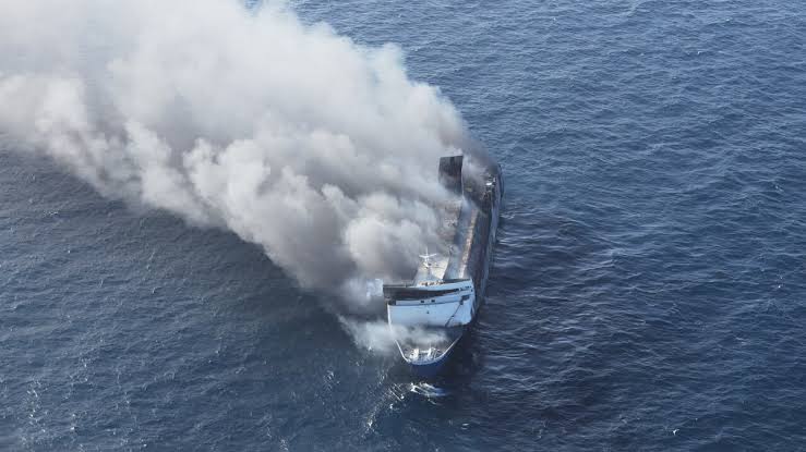 Rescuers say at least 5 dead, unknown number missing in Indonesian ferry fire; survivors recall blasts before the blaze