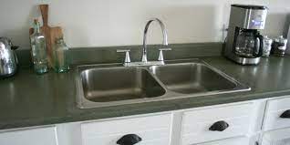 Is this paint job a temporary fix until you are able to replace the surface entirely? Remodelaholic How To Spray Paint Faux Granite Countertops