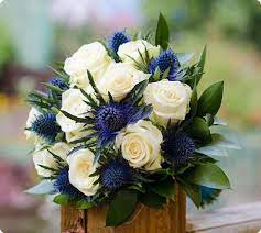 So Pretty White Roses And Thistles Blue Wedding Flowers Wedding Flowers Bridesmaid Flowers