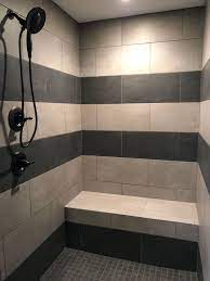 Find your bathroom tile easily amongst the 1,802 products from the leading brands (atlas concorde, casalgrande, marazzi,.) on archiexpo, the architecture and design specialist for your professional purchases. Striped Walk In Tile Shower With Light And Dark Ceramic Tile 2x2 Square Fro Flooring Tileshower Walkinsh Wood Tile Shower Shower Tile Bathroom Shower Tile