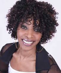 Isabella Broekhuizen after the relaxer damaged her hair and scalp