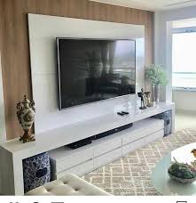 We are big fans of the footstool, not only because you can sit down at the end of the day and put your feet up on them, but you can also place a tray on they bring a feeling of comfort and relaxation into a living room and also provide an opportunity to cover in a favourite fabric. Nice Living Room Storage Cabinet Amazon Only In Shopy Home Design Living Room Designs Tv Room Design Living Room Tv Unit Designs