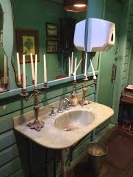 sink with old school candlesticks