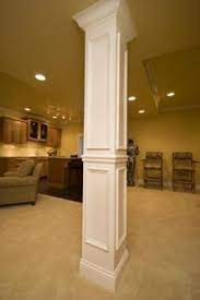 Our decorative basement pole cover design simulates the look of a classic fluted column. 22 Basement Pole Covers Ideas Basement Poles Basement Pole Covers Interior Columns