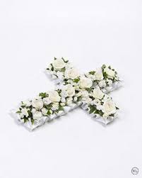 Maybe you would like to learn more about one of these? Petite Cross White Flowers Funeral Flowers London