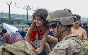 They can be credited with the development of helicopter. Reunited Viral Clip Of Marine Lifting Baby At Airport Wall Captures Kabul Chaos The Times Of Israel
