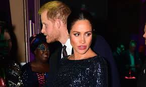 They received a long round of applause from the audience. Meghan Markle Dazzles In Roland Mouret Dress As She Arrives At The Royal Albert Hall With Prince Harry Hello