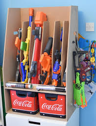 Nerf blasters are not shaped like boxes, so don't arrange them as if they were. Diy Nerf Gun Storage Nerf Storage Organization Ideas For Blasters Accessories I Have A Super Quick But Super Effective Organizing Project Today