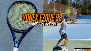 A tattoo on the arm of marton fucsovics of hungary is seen as he prepares to serve during his men's singles first round match against denis shapovalov of canada on day one of the 2020 australian. Yonex Ezone 98 Review Tennisnerd Net Easy To Use For A 98