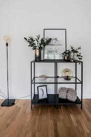 A Black Bookshelf As A Decoration In The Living Room Bucherregal Dekoration Ikea Wohnungswohnzimmer Sc European Home Decor Living Room Decor Home Decor