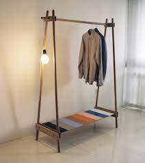 What's the best way to hang a clothing rack? 10 Easy Pieces Freestanding Wooden Clothing Racks Remodelista