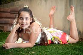 Fainting, also called syncope, is a temporary loss of consciousness caused by a decreased blood flow to the brain. Beautiful Teenage Girl Lying Down In The Grass Stock Photos Freeimages Com