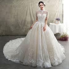 Das neue weiß für bräute der neuzeit. Luxus Herrlich Champagner Durchsichtige Brautkleider Hochzeitskleider 2019 Prinzessin Stehkragen Kurze Armel Ruckenfreies Applikationen Spitze Perlenstickerei Quaste