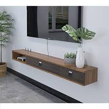 They often come in modular designs that are ideal for storage or decor. Floating Shelf Wooden Floating Tv Stand Wall Media Console Tv Cabinet Storage Shelf For Dvd Blu Ray Players Satellite Tv Box Cable Box Color A Buy Online In Botswana At Botswana Desertcart Com Productid