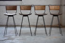 Determined Arthur Umanoff Mid Century Modern Rush Back Swivel Wrought Iron Bar Stools For Raymor U S A 1950s Wrought Iron Bar Stools Iron Bar Stools Retro Bar Stools