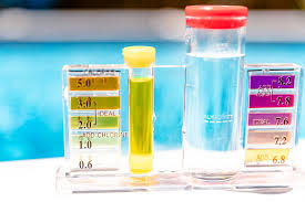 a pool test kit to check water
