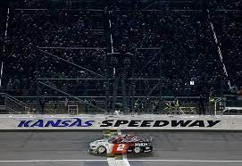 Who conquered the field to win in the heartland? Brad Keselowski Wins Nascar At Kansas Speedway