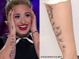It also symbolizes leo, the fifth sign of the zodiac. Demi Lovato S Tattoos Meanings Steal Her Style