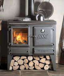 Wood burning kitchen stove with water heater. Multi Fuel Stove Ironheart From Esse Wood Stove Multi Fuel Stove Stove Fireplace