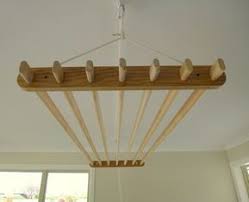 Wooden hanging clothes drying rack. The Oak Pine 7 Lath Slimline Clothes Drying Rack Clothes Drying Racks Wooden Clothes Drying Rack Hanging Drying Rack