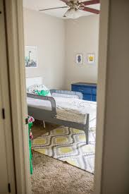Ditch the bed skirt and let the room breathe a bit, like in this little girl's room. Boys Bedroom Ideas Toddler Boy Bedroom Reveal