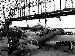 photo wrecked c6n 1 aircraft of japanese navy 121st kokutai in a hangar ushi point airfield tinian mariana islands 30 jul 1944 note the marine corps curt wwii aircraft aircraft photos reconnaissance aircraft