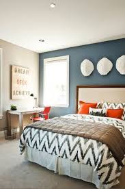 Bedroom With Slate Blue Accent Wall White Trim Orange Accents Benjamin Moore Phillipsburg Blue Guest Bedroom Design Bedroom Wall Colors Guest Bedroom