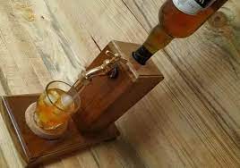 The base is hand turned solid walnut, finished with a light oil the dispenser will accept most all bottle types. 18 Homemade Liquor Dispenser Plans You Can Diy Easily