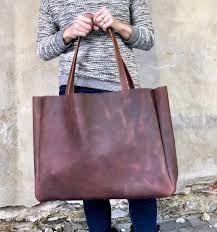 At 25 liters, it has slightly more capacity than your standard everyday carry backpack. Extra Large Leather Tote Bag With Zipper 66296d