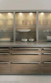 To nail the look, install simple modern kitchen cabinets made of wood, and pair them with marble counters. 57 Amazing Contemporary Kitchen Cabinets Remodel Ideas Contemporarykitchen Cabinet Remod Glass Kitchen Cabinets Contemporary Kitchen Cabinets Kitchen Design