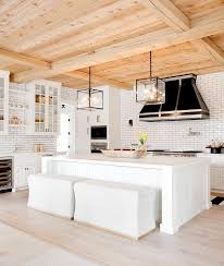 Kitchen islands with seating and storage are popular in kitchen designs today. White Storage Bench For Island Seating Transitional Kitchen