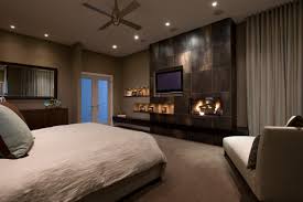 A samsung television is mounted over the fireplace in the master bedroom of a manhattan duplex decorated by steven gambrel. Master Bedroom Fireplace Houzz