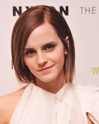 Short style with loose curls. Emma Watson Layered Razor Haircut For Short Hair Hairstyles Weekly